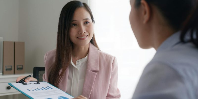 asia-woman-real-estate-sale-agent-or-trader-advice-sitting-at-lawyer-office-desk.jpg
